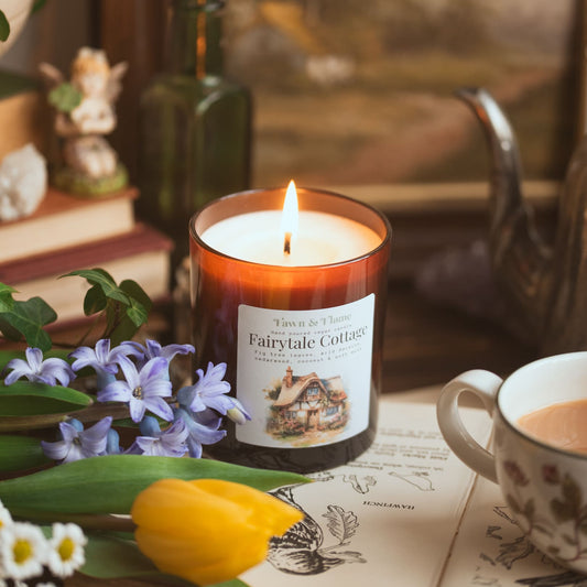 fairytale cottage vegan candle with flowers and tea.