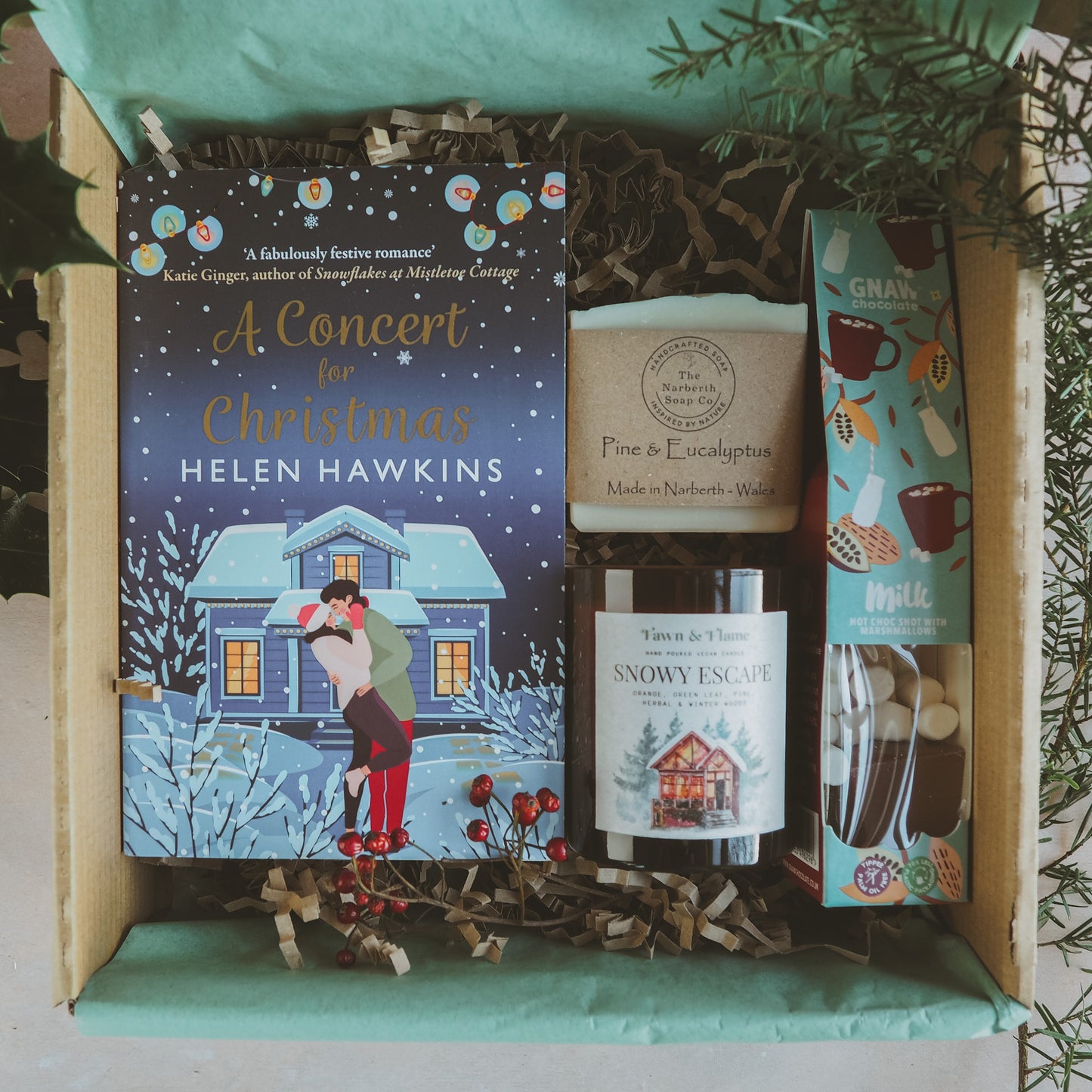 Snowy Escape Winter Gift Box Bundle with book, candle, soap and hot chocolate.