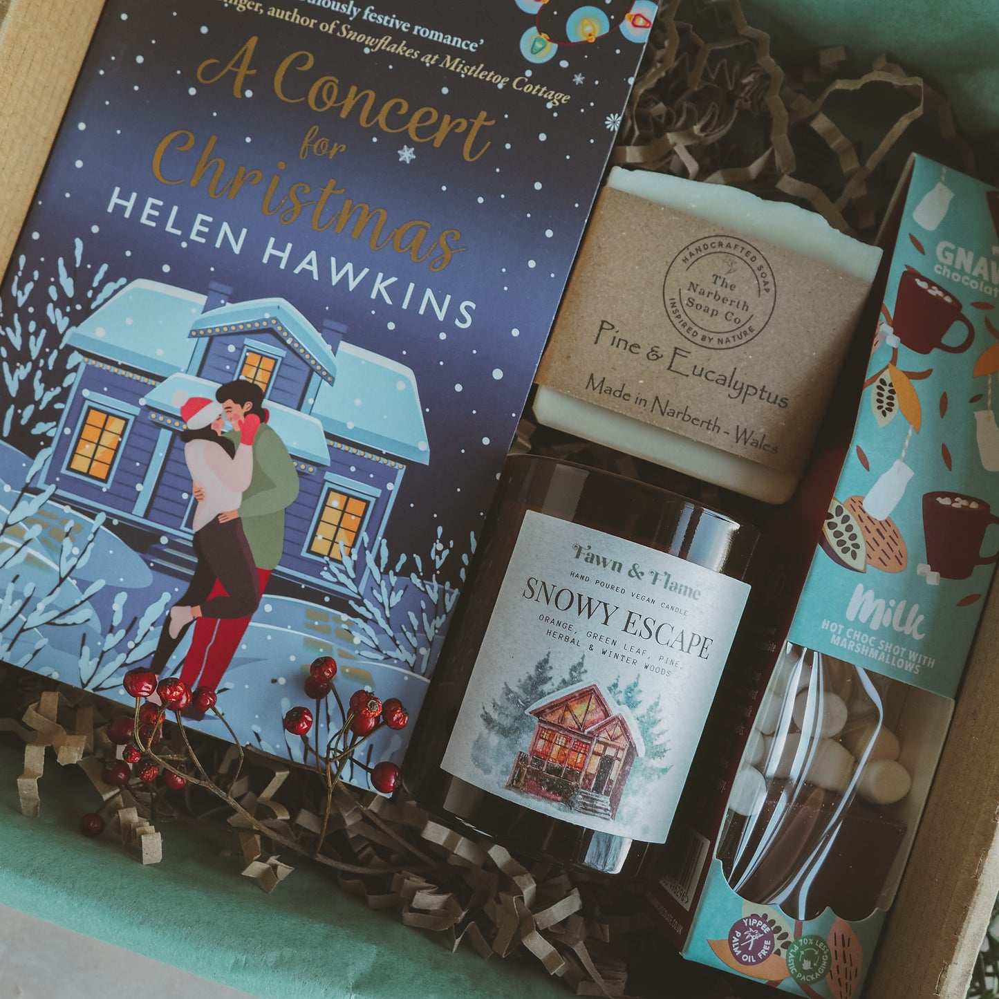 Snowy Escape Winter Gift Box Bundle with book, candle, soap and hot chocolate.